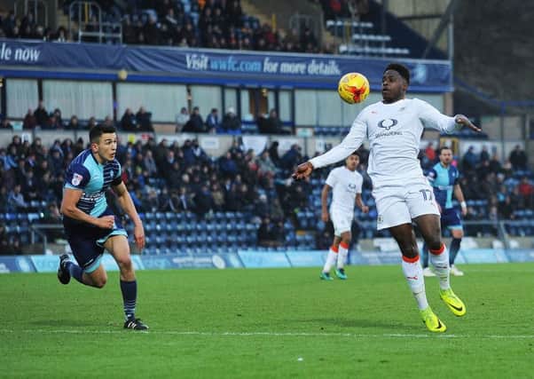Pelly-Ruddock Mpanzu controls on his chest against Wycombe
