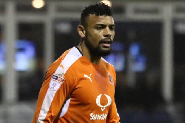 Town striker Isaac Vassell