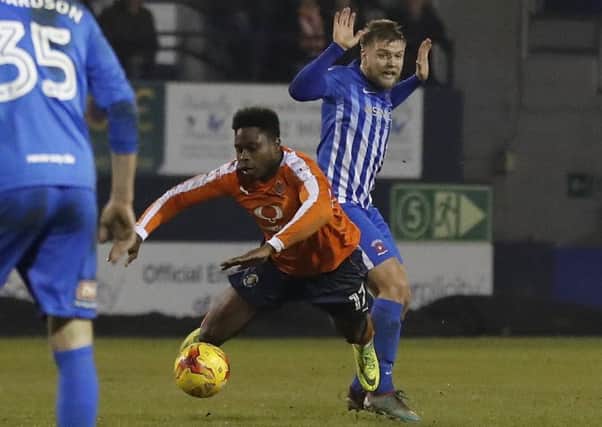 Pelly-Ruddock Mpanzu is fouled on his 100th appearance for Luton Town