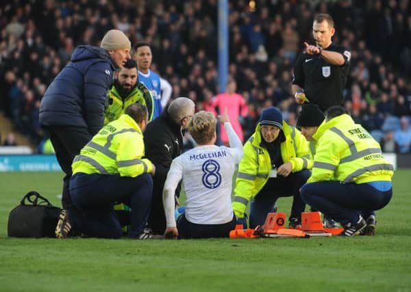 Cameron McGeehan suffers a broken leg against Portsmouth