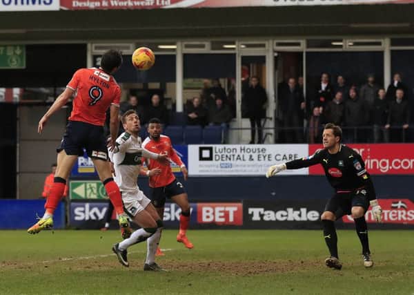 Danny Hylton can't quite turn this cross in against Plymouth