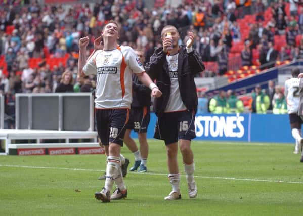 Michael Spillane and Rossi Jarvis celebrate Luton's win at Wembley in 2009