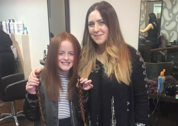 Luton schoolgirl Emma Lavin with her haidresser cousin Justina
