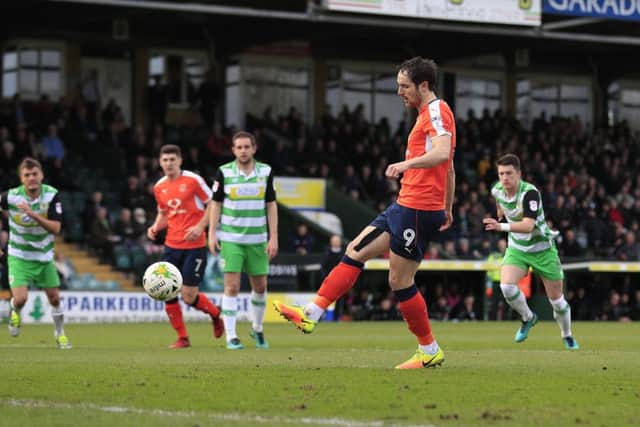 Danny Hylton converts from the spot on Saturday