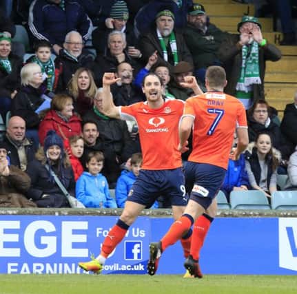 Danny Hylton celebrates his second of the game at Yeovil on Saturday