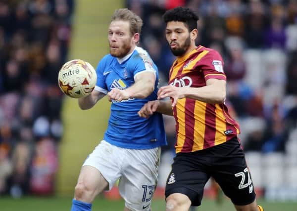 Craig Mackail-Smith of Peterborough in action against Bradford City recently - pic: Joe Dent