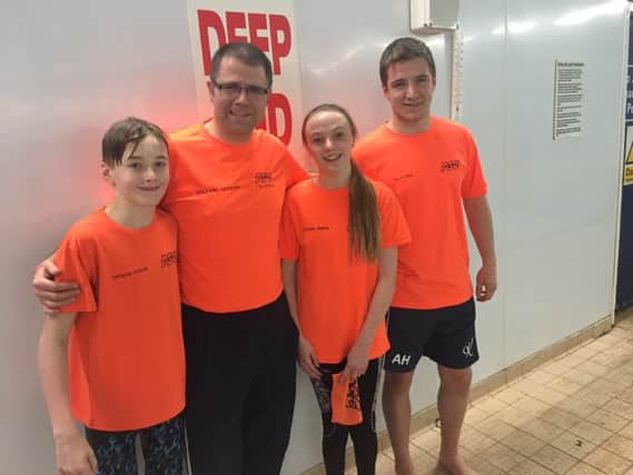 Putteridge Swimming Club welfare officer Ian Dickson with talented young disabled swimmers (from left) Cameron Connelly, Jordan Quinn and Aaron Hird