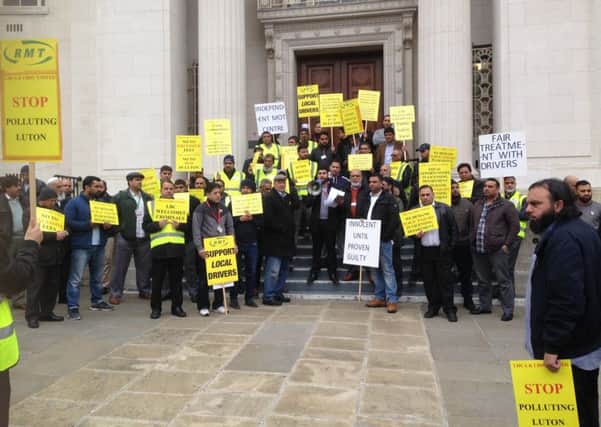 Luton cab drivers gathered outside the town hall to protest against Luton Borough Council's "unfair and biased policies" towards outside companies