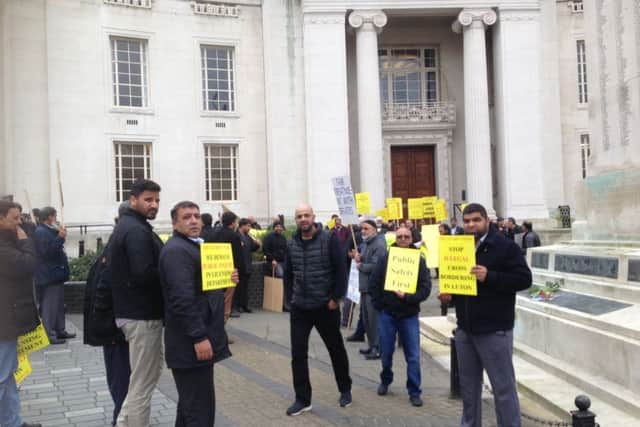 Luton cab drivers gathered outside the town hall to protest against Luton Borough Council's "unfair and biased policies" towards outside companies