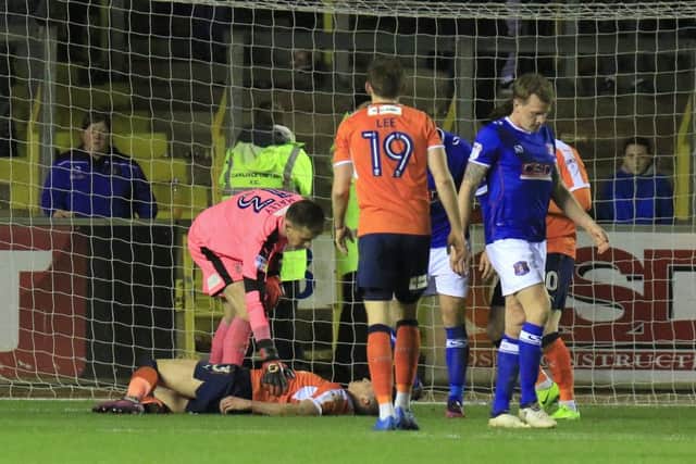 Dan Pott is injured against Carlisle on Tuesday night