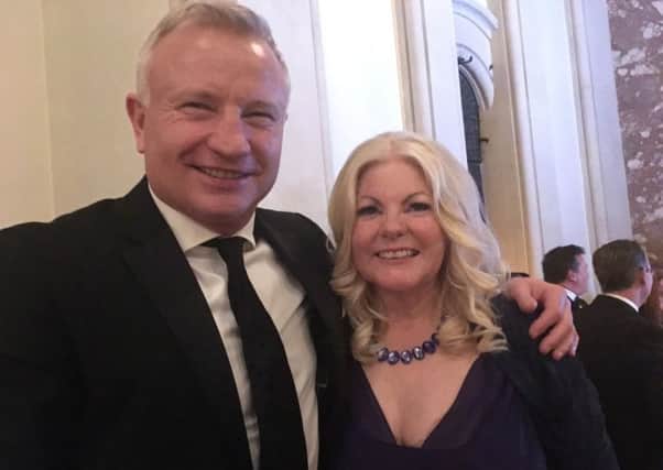 Former IBO boxing champion Billy Schwer with Age Concern Luton director Colette McKeaveney at a black tie event in aid of the charity