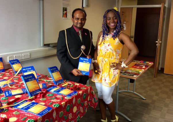 Luton poet laureate Mary Emeji with mayor Cllr Tahir Khan at the launch of her book My Friend the Sun