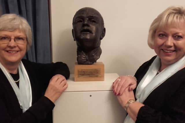 Former Luton Girls Choir members Lynda Davies (nee Janes) and Alison Nicol recreate a picture that appeared in the Luton News in 1979 when the bust of choir founder Arthur E Davies was unveiled