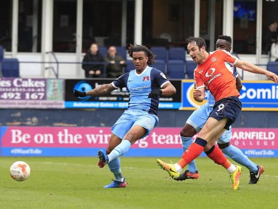 Danny Hylton scores Town's opener this afternoon.