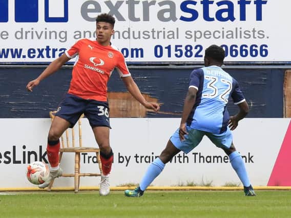 James Justin looks up against Leyton Orient