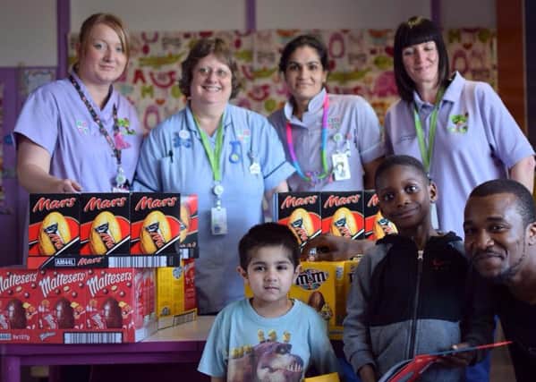 Luton rapper Dizzle gave 200 Easter eggs to young patients at the Lution & Dunstable Hospital