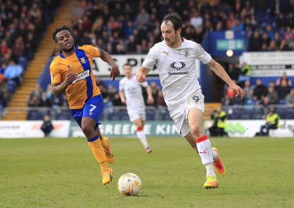 Hatters striker Danny Hylton gets free against Mansfield on Monday
