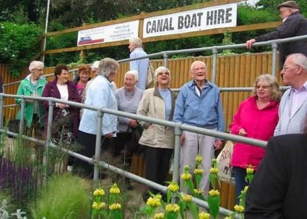 Volunteers at CaddingtonCare organise a variety of outings for the elderly and disabled, including canal trips on specially adapted boats