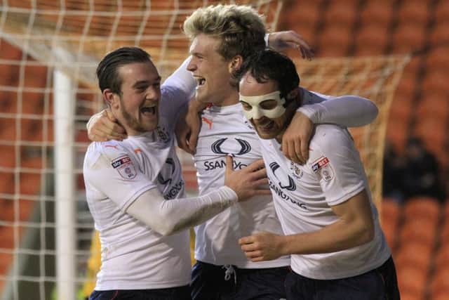 Cameron McGeehan celebrates his goal at Blackpool