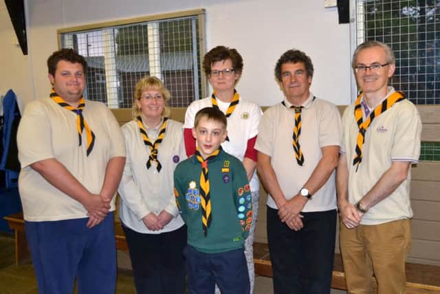Kai with his proud Cub Scout Leaders