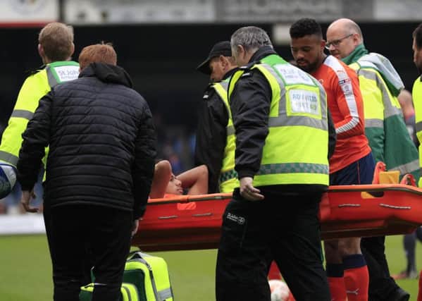 James Justin was stretchered off against Morecambe