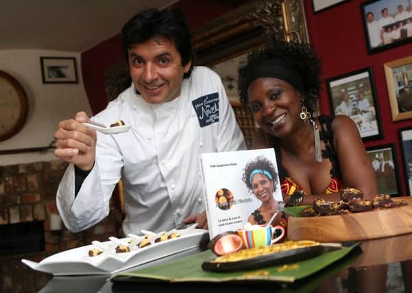 Jean-Christophe Novelli and Ghanaian-born Patti Sloley who is running an African fusion cooking course at his academy in Tea Green.
