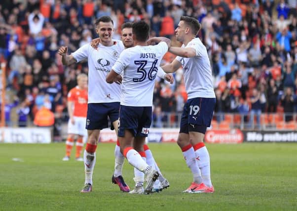 Hatters defender Dan Potts celebrates his first goal for the club