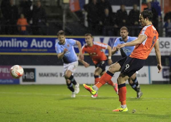 Danny Hylton scores from the spot against Blackpool