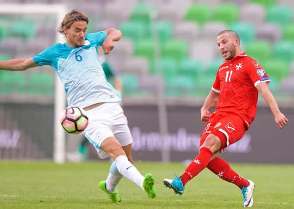 Luke Gambin in action for Malta against Slovenia - pic: Paul Zammit Cutajar