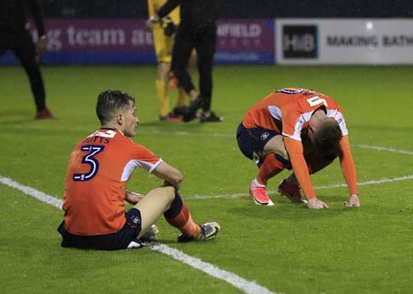 Dan Potts and Jordan Cook are stunned by Town's play-off exit