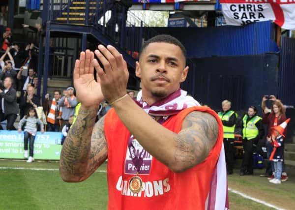 Luton striker Andre Gray celebrates winning the Conference title