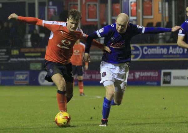 Hatters midfielder Cameron McGeehan has been linked with a move away from Luton