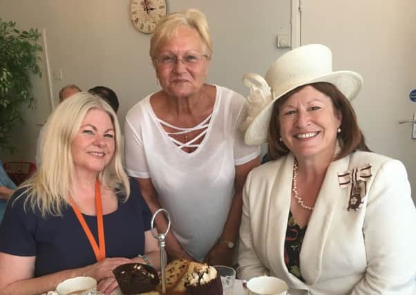 TEA TIME: From left ACL director Colette McKeaveney, volunteer Hilary Rohane and Lord Lieutenant Helen Nellis