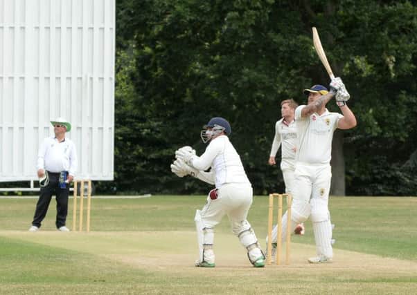 Ben Abbott hits out on his way to a century against Ampthill