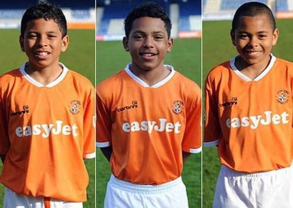 Jay Dasilva, right, with brothers Cole and Rio during their Luton Town days