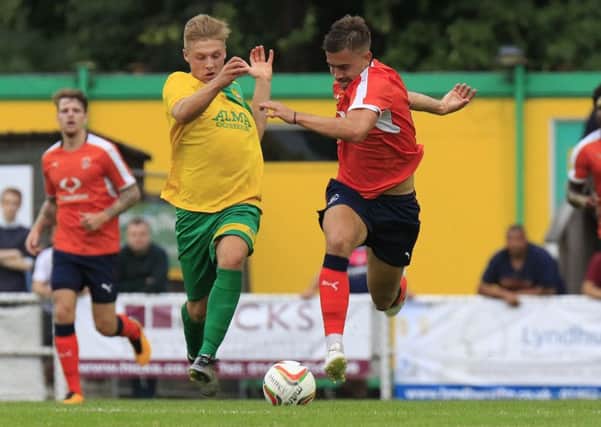Olly Lee sprints away against Hitchin Town on Tuesday night