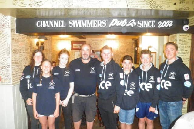 The group took part in a relay swim across the English Channel