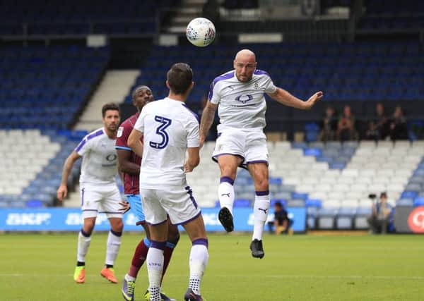 Alan McCormack heads away during Town's win over Scunthorpe