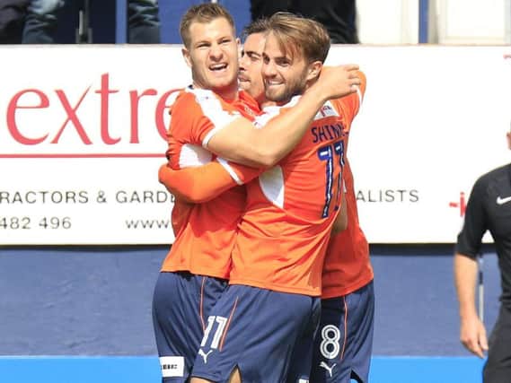 Olly Lee celebrates with James Collins and Andrew Shinnie after equalising for the Hatters