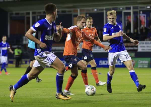 Andrew Shinnie looks for a way through against Ipswich