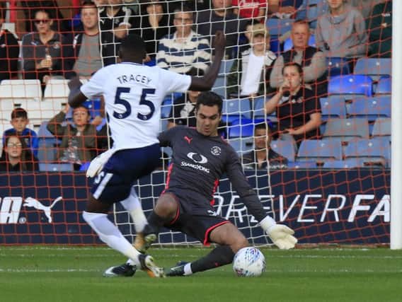 Hatters keeper James Shea denies Spurs forward Shilow Tracey on Tuesday night