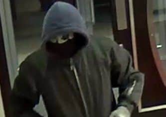 Police release CCTV images after an armed robbery at a casino in Luton