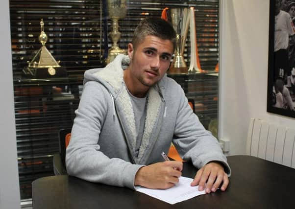 Aaron Jarvis puts pen to paper on his Luton contract