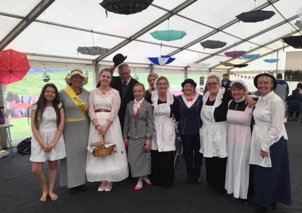 Volunteers dress up as characters from Mary Poppins for the VIP tea