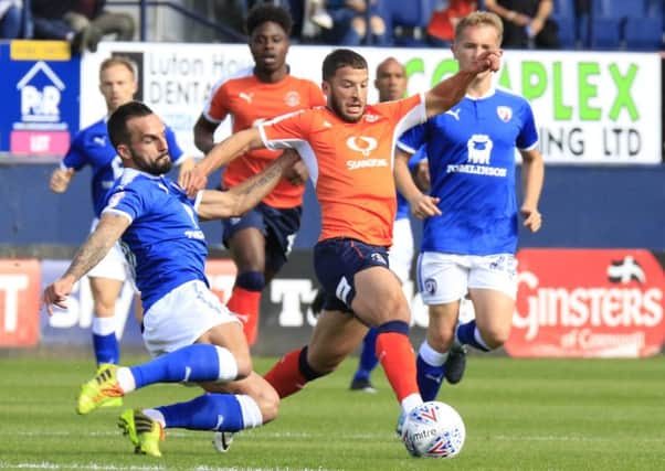 Luke Gambin escapes a challenge against Chesterfield