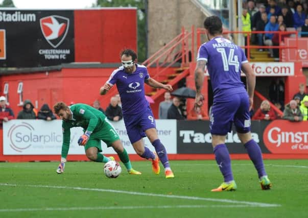 Danny Hylton is about to make it 1-0 to Luton at Cheltenham last season