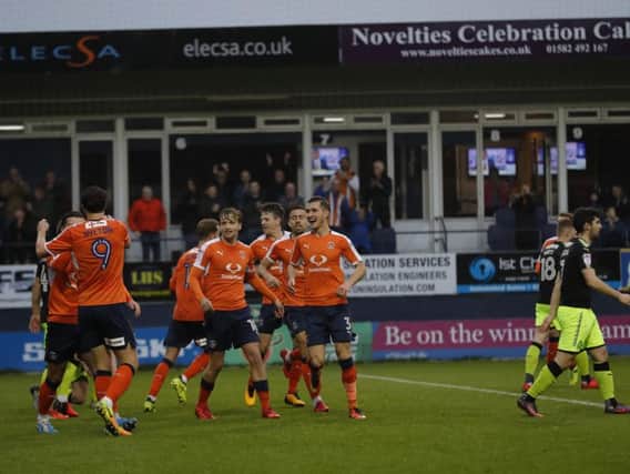 The Hatters celebrate going 1-0 up against Cambridge