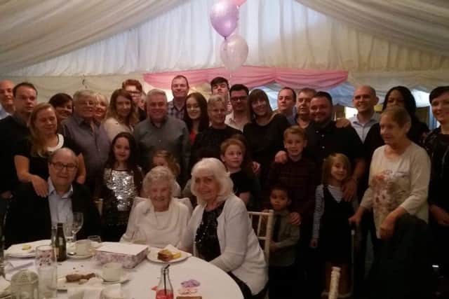 Eva (front, middle) on Sunday.  She also has 75th and 76th wedding anniversary cards from The Queen. Alan says Eva likes to keep active; when at The White Hart , George still worked at his shoe shop and Eva had lead role at the pub!