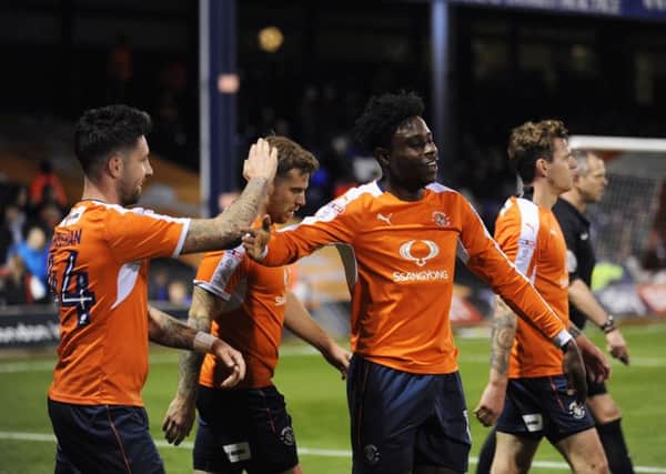 Luton celebrate going 2-0 in front against Carlisle